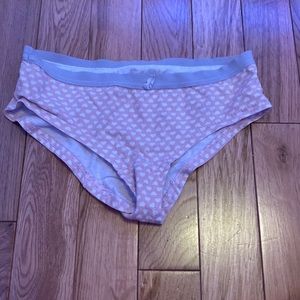 Color is pink with white hearts brand is unknown size is a seven